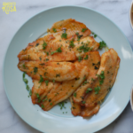 Tilapia con mantequilla de ajo y perejil 500 gr / 1KG